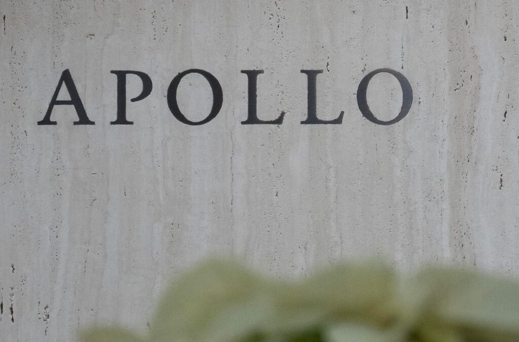 Apollo Global Management signage in New York, US, on Tuesday, Dec. 5, 2023. Apollo's CEO said it's getting harder for active managers to beat indexes in public markets and that it is easier for investors to find alpha in private markets. Photographer: Jeenah Moon/Bloomberg via Getty Images