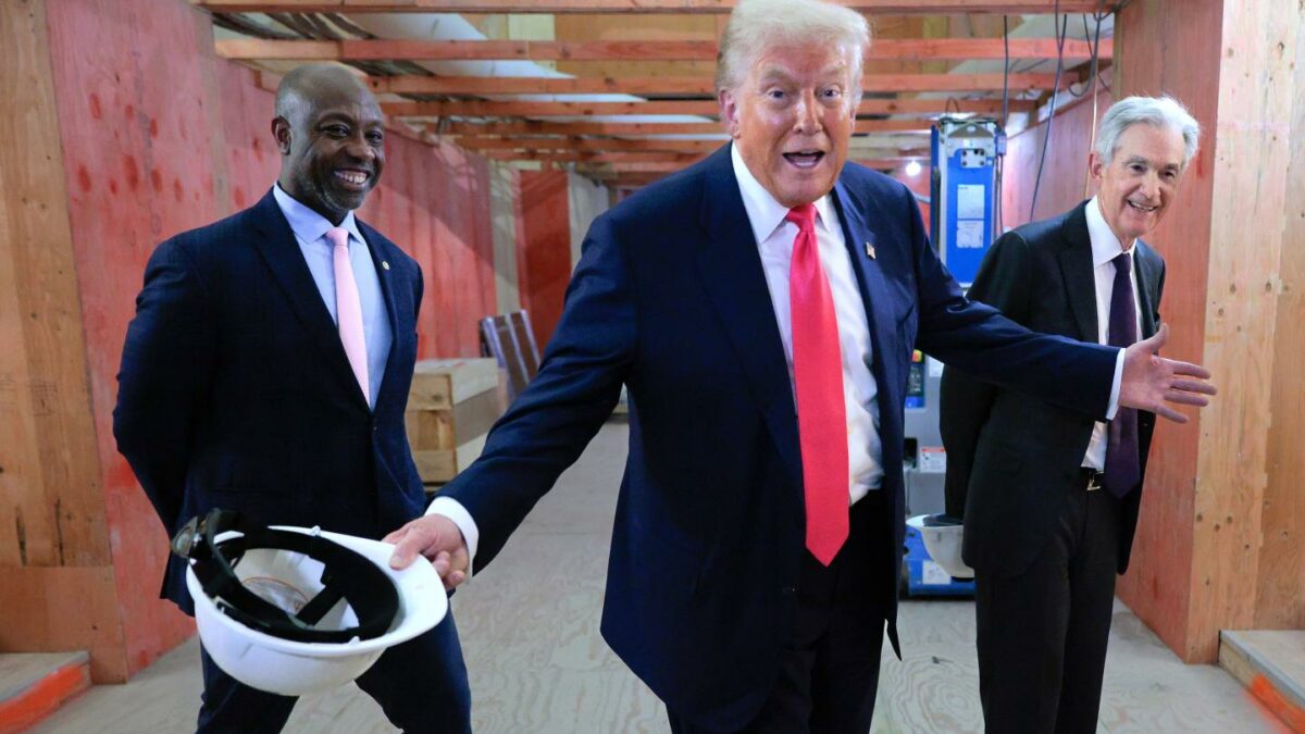 From left: U.S. Sen. Tim Scott, President Donald Trump, and Federal Reserve Chair Jerome Powell tour the Federal Reserve’s headquarters renovation project, July 24, 2025.