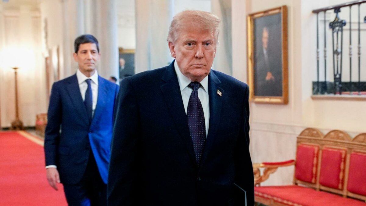 President Donald Trump, right, and Kevin Warsh arrive for a swearing-in ceremony in the East Room of the White House on Friday, May 22, 2026.