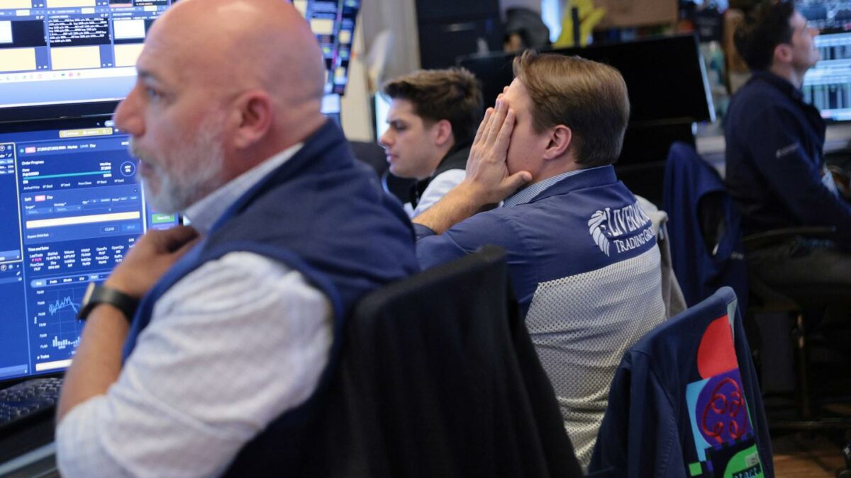 Traders work on the floor of the New York Stock Exchange during afternoon trading on June 10, 2026 in New York City.