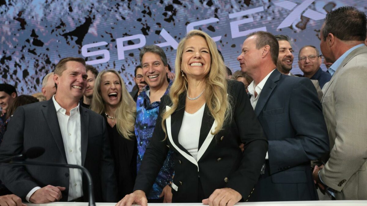 Shotwell stands and smiles widely