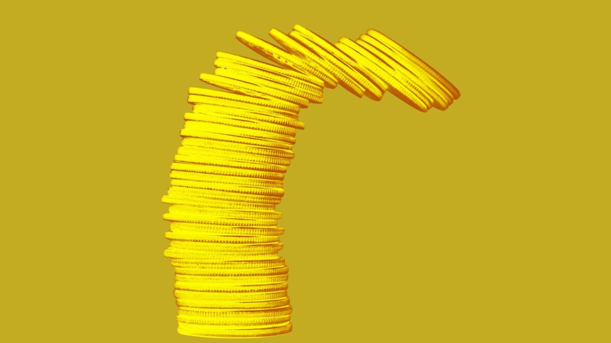 A stack of coins toppling over.
