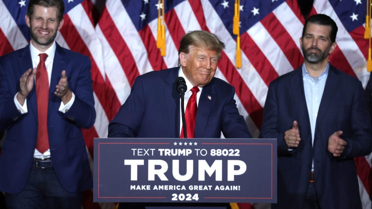 President Donald Trump, flanked by sons Donald Jr., left, and Eric.