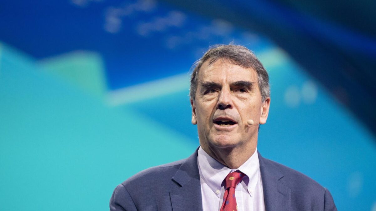 Tim Draper often wears a Bitcoin-branded tie.