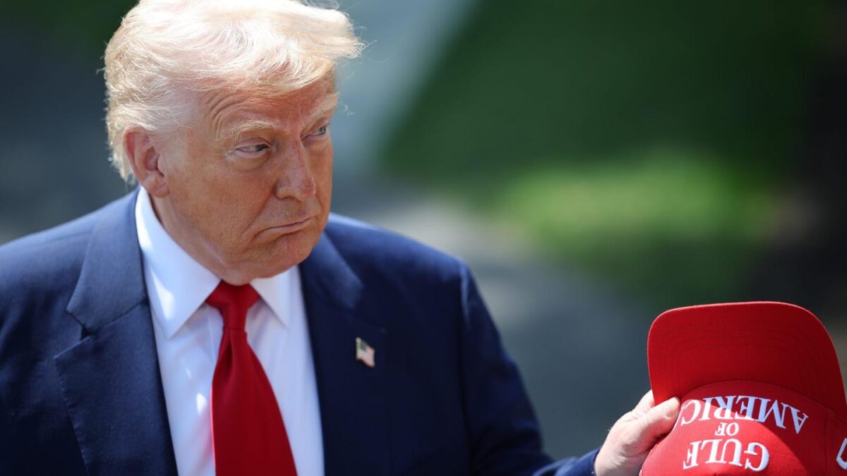 President Donald Trump answers questions from the media outside the White House on Tuesday.