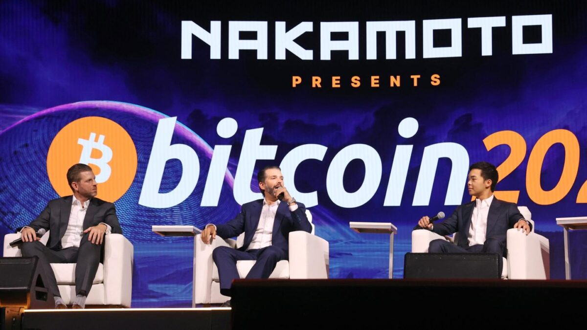 Eric Trump (left), Donald Trump Jr. (center), and Mike Ho, executive chairman and board member of American Bitcoin.