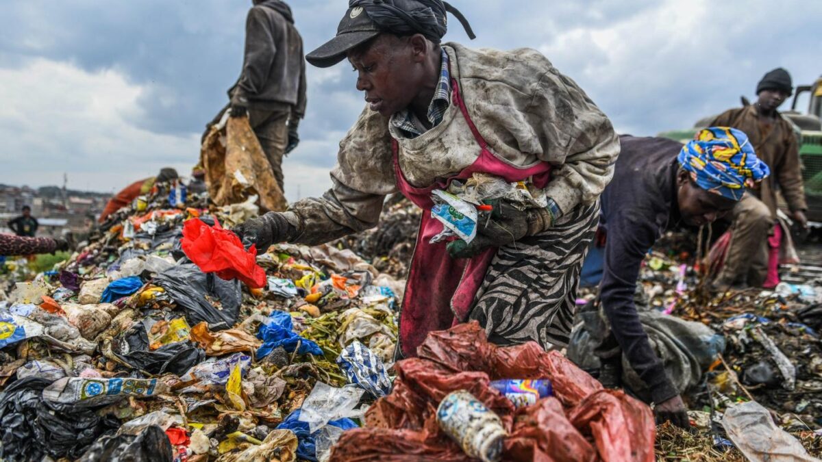People search for recyclable materials among piles of waste at Dandora dumpsite in Nairobi, Kenya on June 4, 2025.